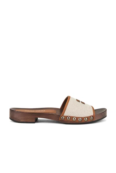 Miu Miu Canvas And Leather Studded Clog Sandals In Neutral