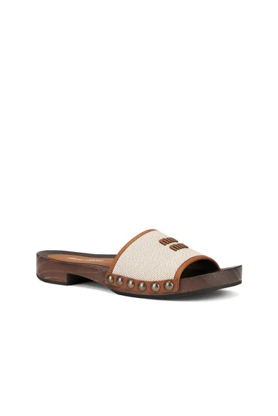 Miu Miu Canvas And Leather Studded Clog Sandals In Neutral