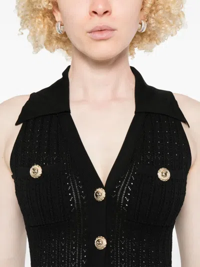 Self-portrait Pointelle-knit Mini Dress With Flap Pockets And Chain-link Accents In Black