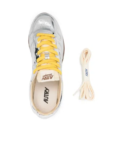 Autry Front Lace Sneakers In Bright Yellow And Shiny Silver In Multi