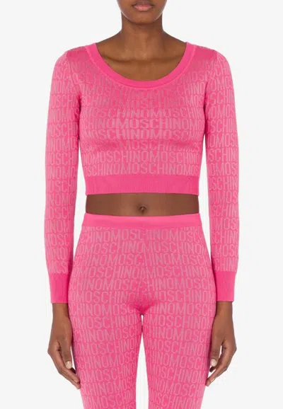 Moschino Cropped Pullover With Allover Logo Pattern In Pink