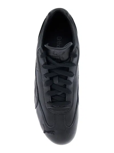 Puma 'speedcat' Black Low Top Sneakers With Embossed Logo On The Tongue And Contrasting Sole In Black