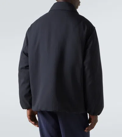 Jil Sander Wool Coat With Long Sleeves And Curved Hem In Black