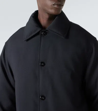 Jil Sander Wool Coat With Long Sleeves And Curved Hem In Black