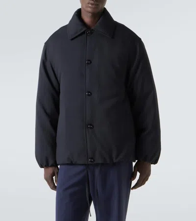 Jil Sander Wool Coat With Long Sleeves And Curved Hem In Black