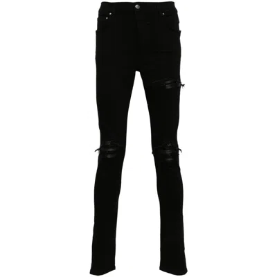 Amiri Slim Fit Distressed Trousers With Rivet Detailing
