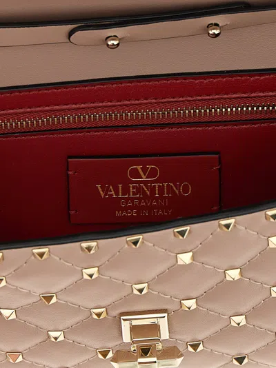 Valentino Garavani Rockstud Spike Nappa Leather Crossbody Clutch Bag Woman Poudre Uni In Pink