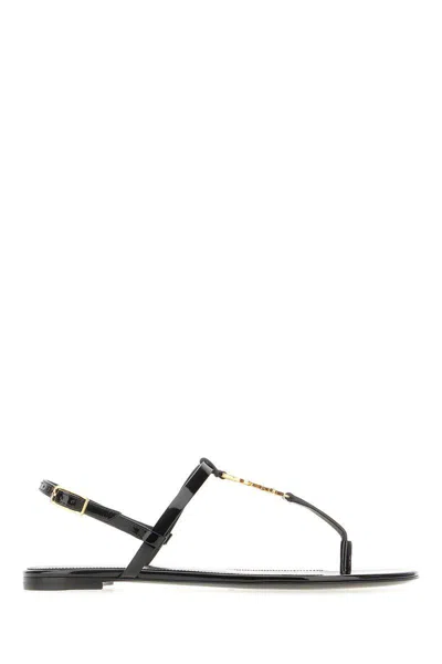 Saint Laurent Black Cassandra Flat Sandals In Crocodile-embossed Leather With Gold-tone Monogram