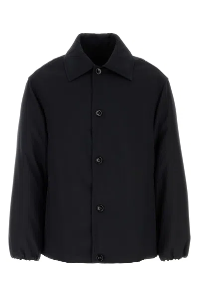 Jil Sander Wool Coat With Long Sleeves And Curved Hem In Black