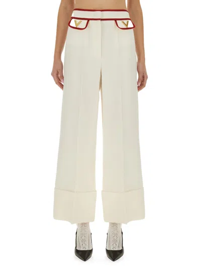 Valentino Ivory Trousers With Gold V In Neutral