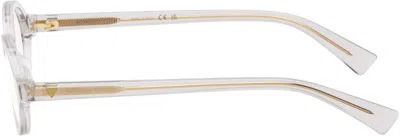 Bottega Veneta Transparent Triangle Stud Logo Round Glasses In Gray