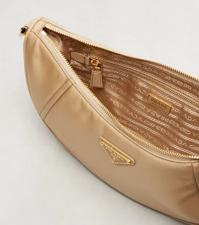 Prada Re-nylon Demi-lune Shoulder Bag In Brown