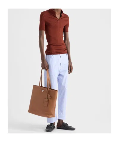 Prada Ribbed Knit Cotton Polo Shirt In Brown