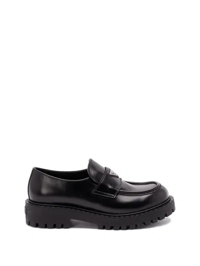 Prada Monolith Leather Loafers In Black