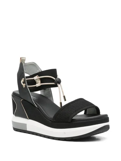 Nerogiardini Bungee Platform Wedge Sandal In Black