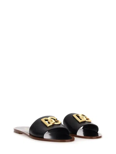 Dolce & Gabbana Flat Leather Slide Sandals With Front Embellishment In Black