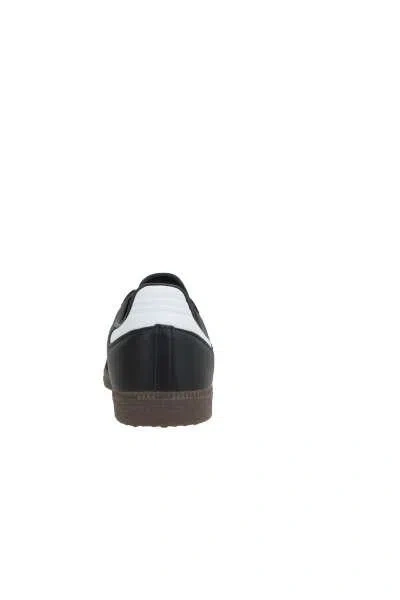 Adidas Originals Low-top Rubber Sole Sneakers With Contrast Stripes In Black