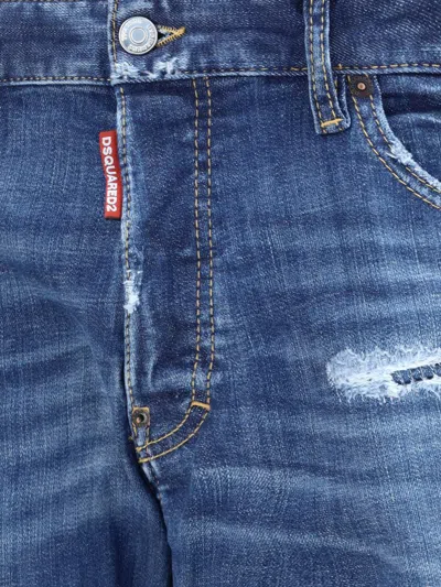Dsquared2 Blue Jeans With Ripped Details And Logo Patch On The Rear
