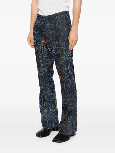 Masu Flocky Rainbow Web Flare Pants In Blue