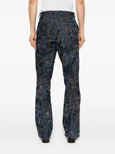 Masu Flocky Rainbow Web Flare Pants In Blue