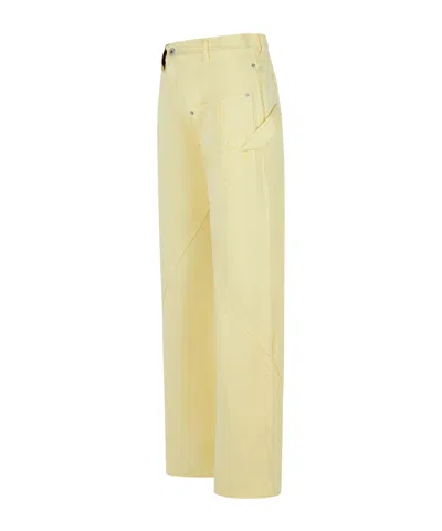 Jw Anderson Cotton Trousers With Wide Twisted Leg In Yellow