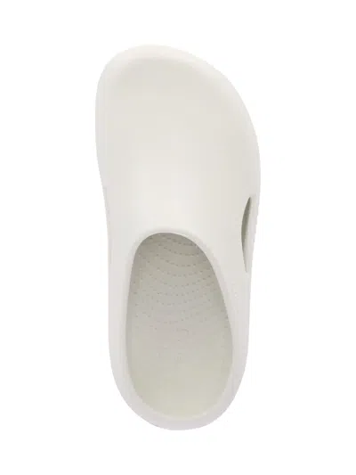 Crocs Logo-embossed Round-toe Slides In Neutral