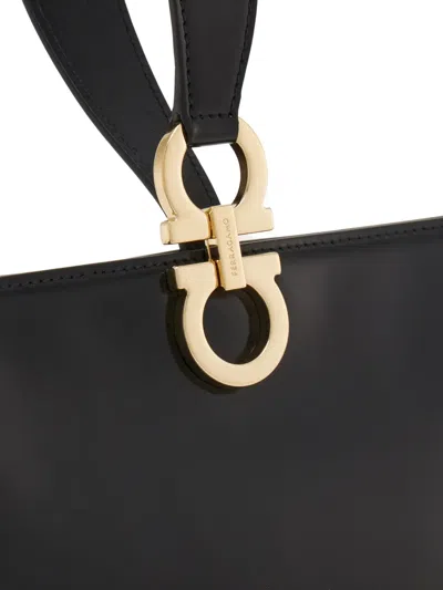 Ferragamo Mini Embellished Patent-leather Clutch In Black