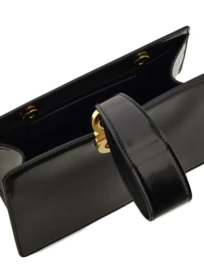 Ferragamo Mini Embellished Patent-leather Clutch In Black
