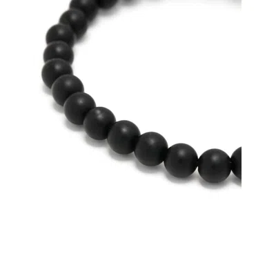 Alexander Mcqueen Skull Pearl Bracelet In Black