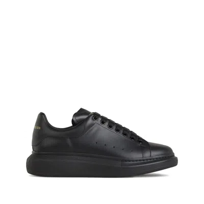 Alexander Mcqueen Black Sneakers With Logo Lettering On The Rear And Oversize Rubber Sole In Leather