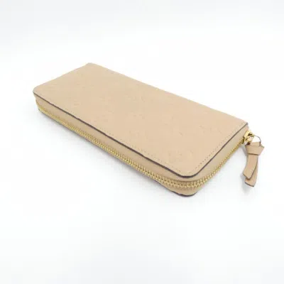 Pre-owned Louis Vuitton Monogram Empreinte Dune Leather Long Wallet (bi-fold) ()