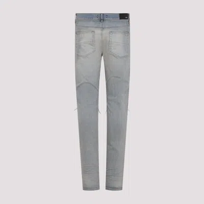 Amiri Mx1 Slim Fit Jeans With Distressed Red Accents
