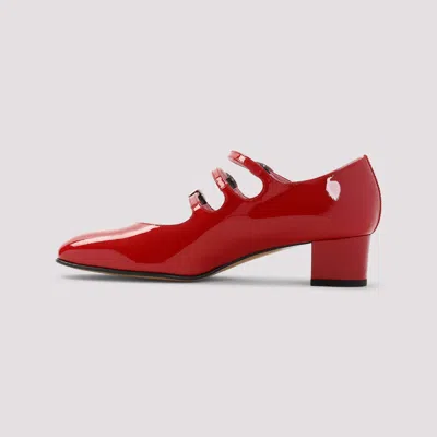 Carel High-shine Side-buckle Pumps In Red