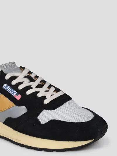 Autry Low Sneaker With Contrast Stitching And Mesh Panels