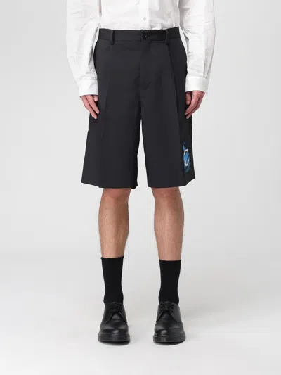 Undercover Bermuda Shorts With Back Pockets And Graphic Print In Black