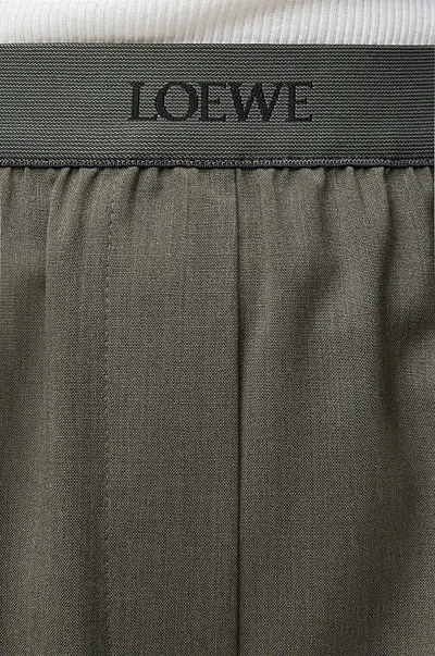 Loewe Womens Khaki Green Logo-waistband Straight-leg Woven Trousers In Black