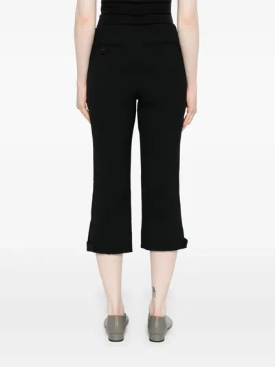 Victoria Beckham Buttoned Cuff Cropped Wool Trousers In Black