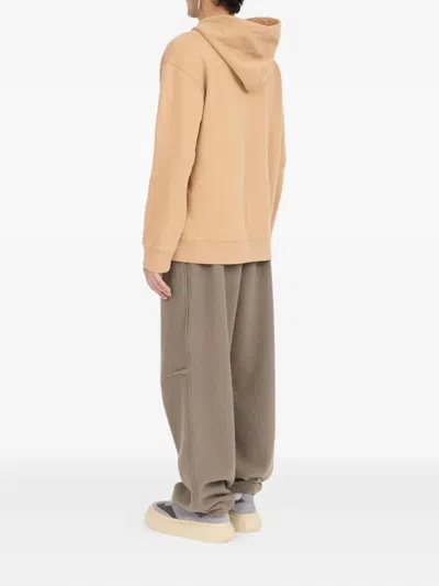 Mm6 Maison Margiela Mm6 By Maison Margiela Relaxed-fit Cotton Hoodie With Unique Graphic Print In Brown