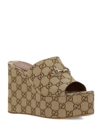 Gucci Gg Monogram Wedge Sandals With Clamp In Brown