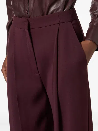 Elisabetta Franchi Trousers With Front Pleats And Belt Loops In Red