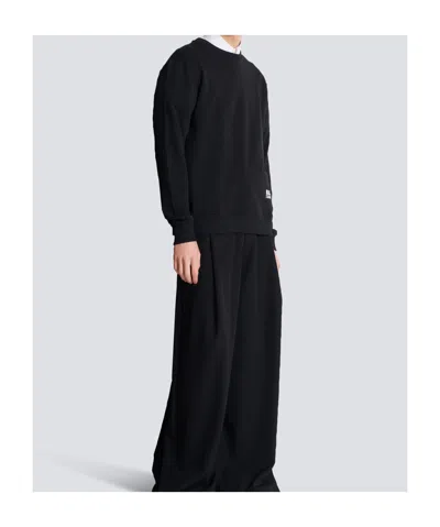 Balmain Logo Stamp Print Sweatshirt In Black