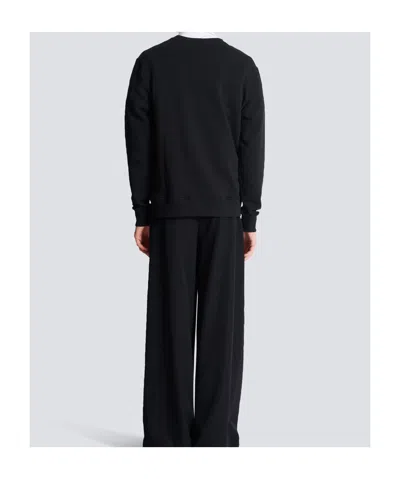 Balmain Logo Stamp Print Sweatshirt In Black