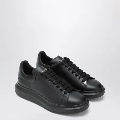 Alexander Mcqueen Black Sneakers With Logo Lettering On The Rear And Oversize Rubber Sole In Leather In Black