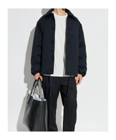 Jil Sander Wool Coat With Long Sleeves And Curved Hem In Black