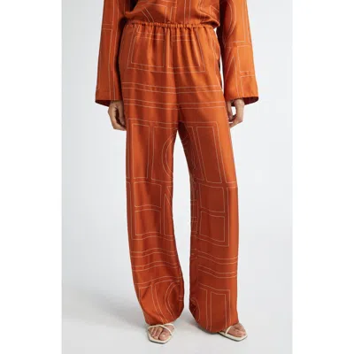 Totême Toteme Women Monogram Silk Pajama Pants In Orange