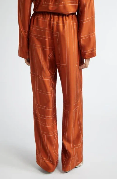 Totême Toteme Women Monogram Silk Pajama Pants In Orange