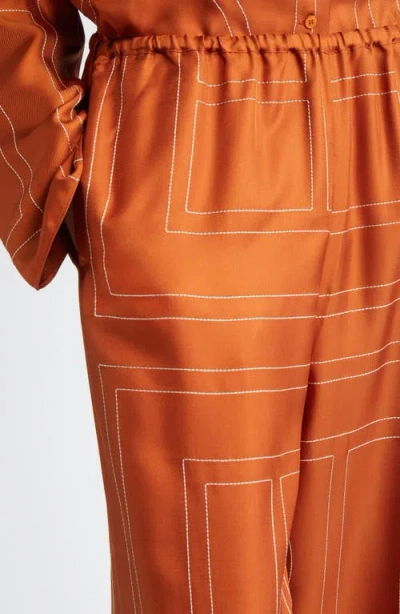 Totême Toteme Women Monogram Silk Pajama Pants In Orange