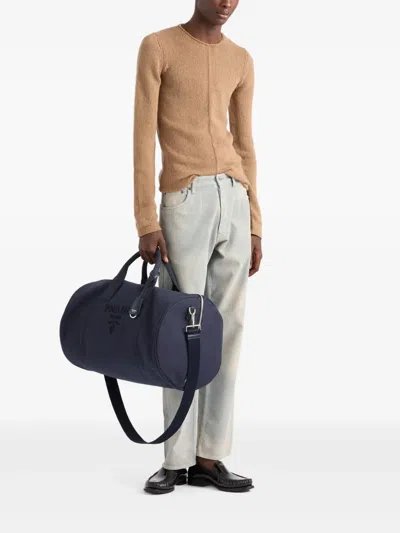 Prada Logo-embossed Duffle Bag In Blue