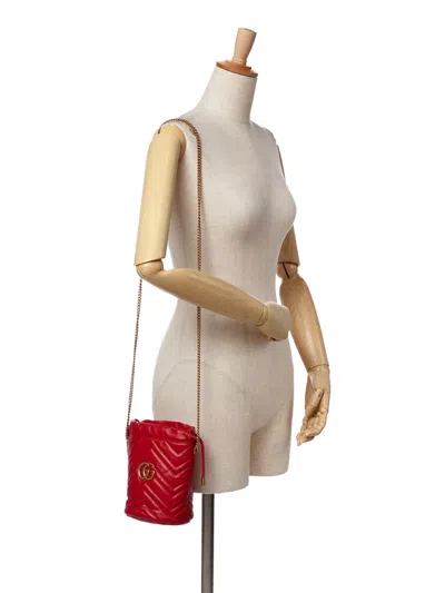 Pre-owned Gucci 2016-2024 Small Gg Marmont Matelasse Leather Bucket Bag In Red