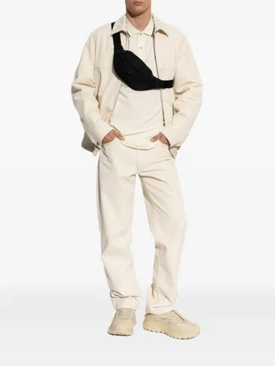 Moncler Mens Logo-embroidery Stripe-trim Cotton-jersey Polo Shirt Cream In Neutral